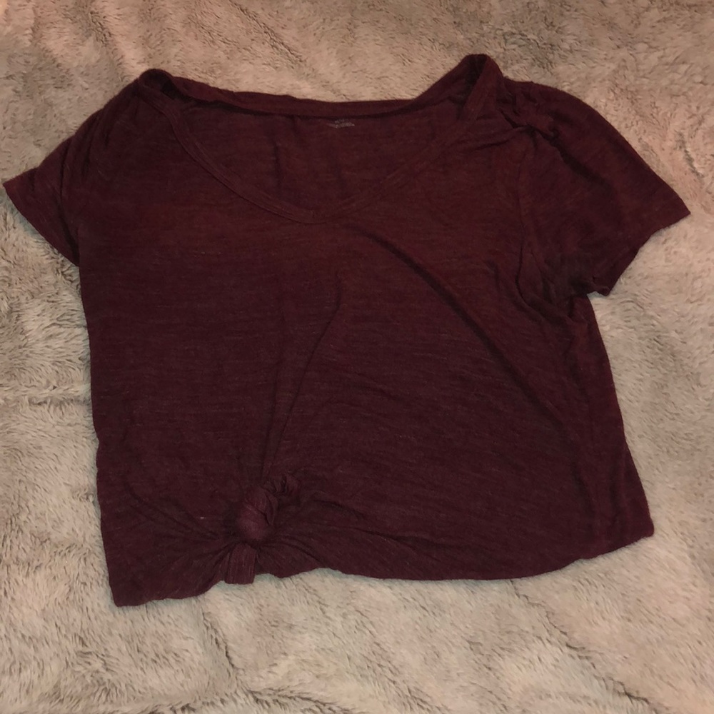 maroon t shirt with a knot in the front